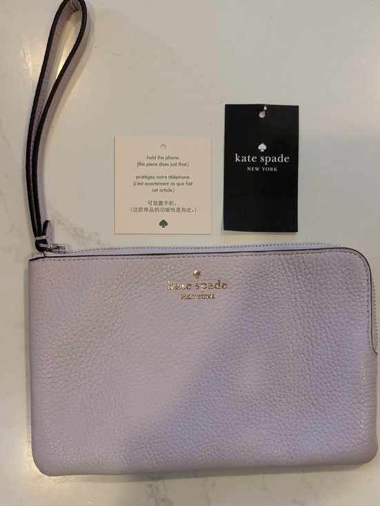 kate spade Handbags - kate spade Lilac Pebble Leather Wristlet with Gold Logo